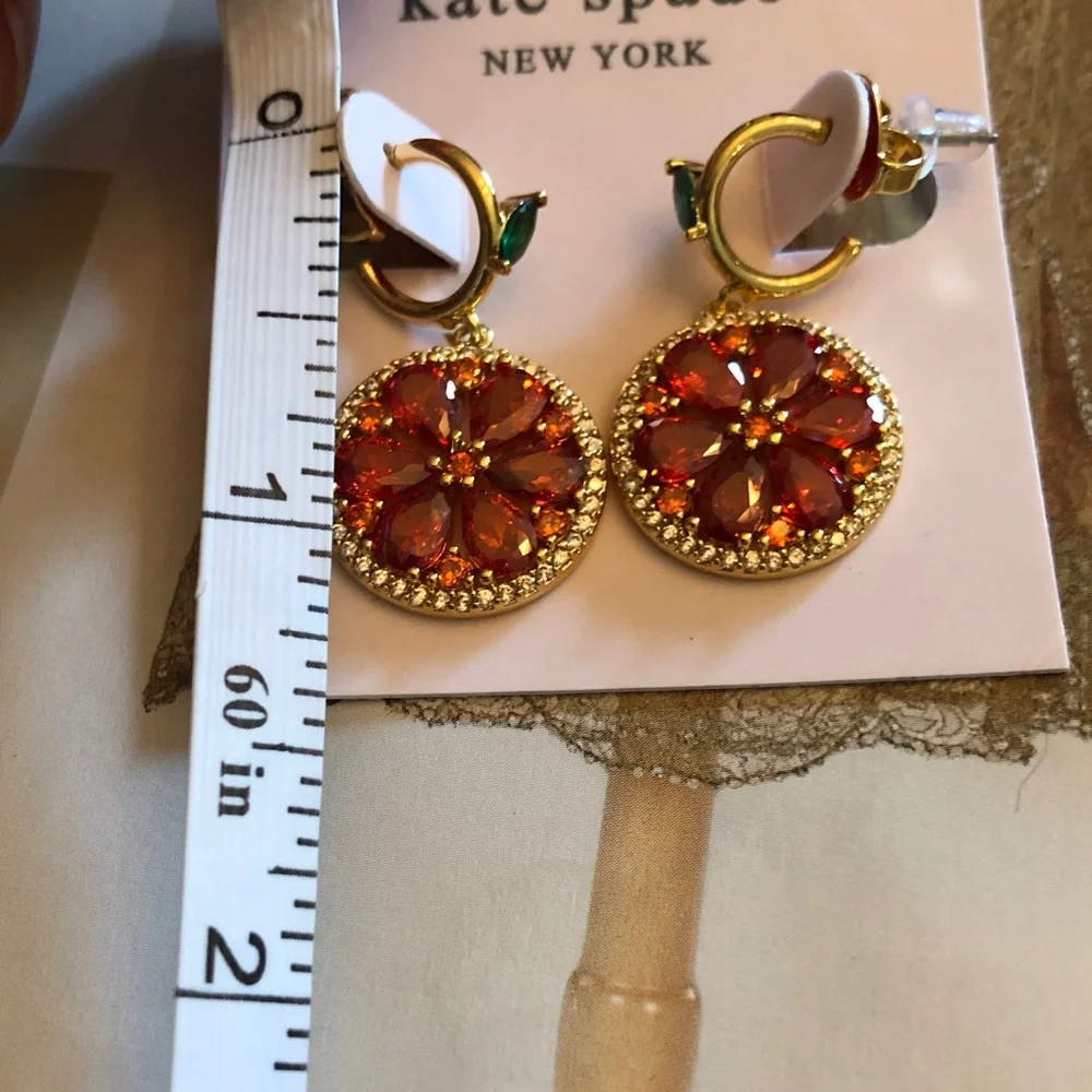Authentic Kate Spade crystal orange design Earrings. New on card.